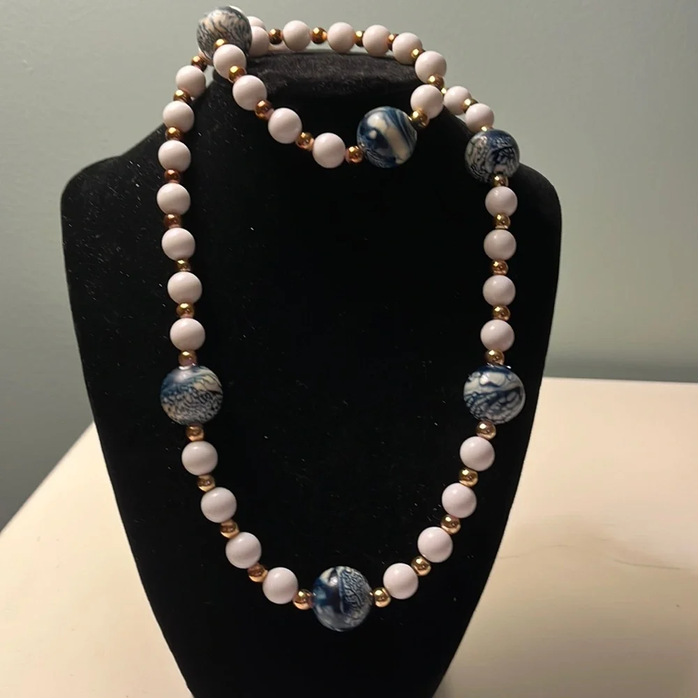 N45. Long blue and white beaded necklace. - Picture 1 of 3
